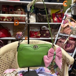 Coach Green Leather Shoulder Bag with Pink Bow Accent